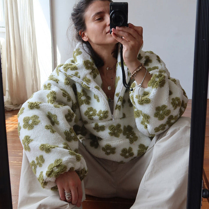 Pullover donna caldo e cozy con stampa floreale e finitura effetto teddy. Ideale per l'inverno.