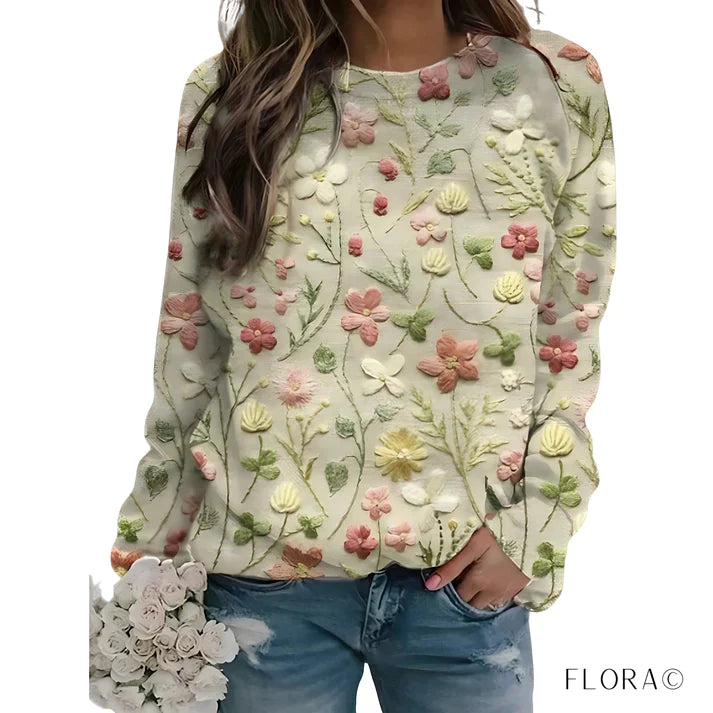 Maglione donna beige girocollo con elegante fantasia floreale in rilievo, per comfort chic primavera autunno.