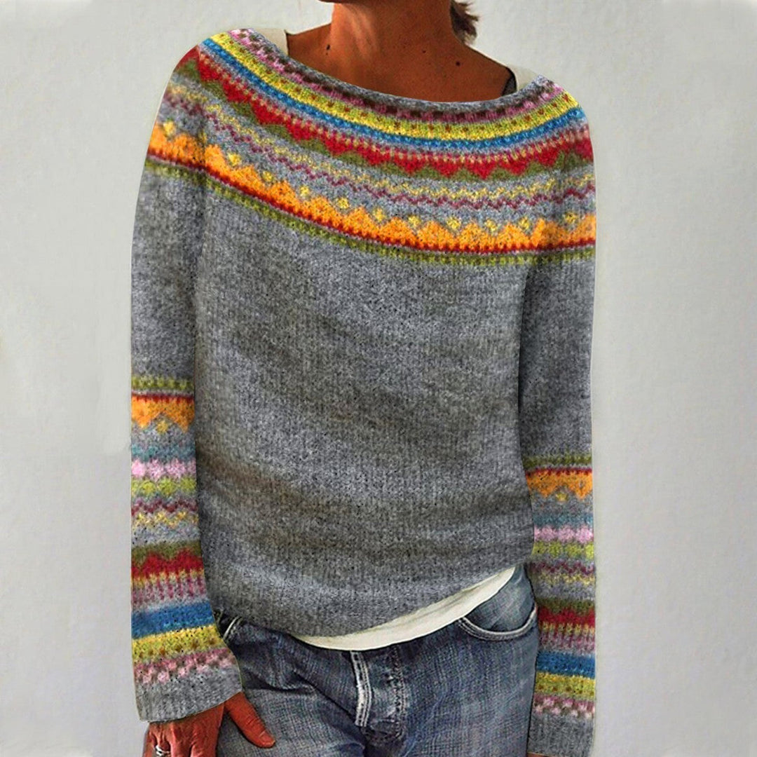 Maglione donna invernale con motivo nordico e scollo a barca, ideale per comfort casual chic.