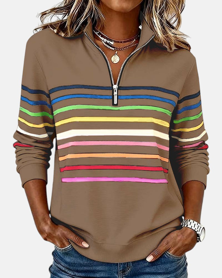 Maglione donna comodo, collo alto e mezza zip. Abbigliamento casual per la stagione fredda.