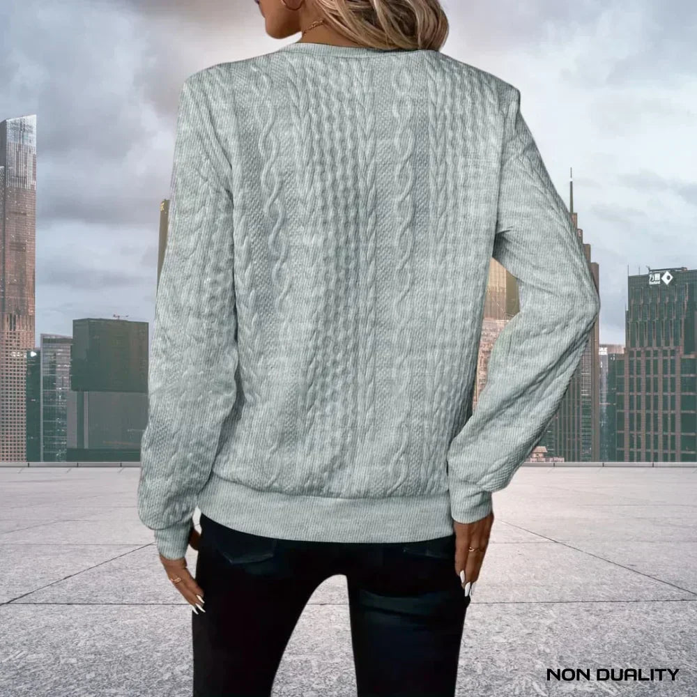 Maglione donna mezza zip e trama a trecce, scollo alto. Pullover comodo e versatile per abbigliamento autunno inverno.