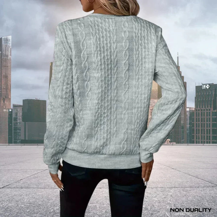Maglione donna mezza zip e trama a trecce, scollo alto. Pullover comodo e versatile per abbigliamento autunno inverno.