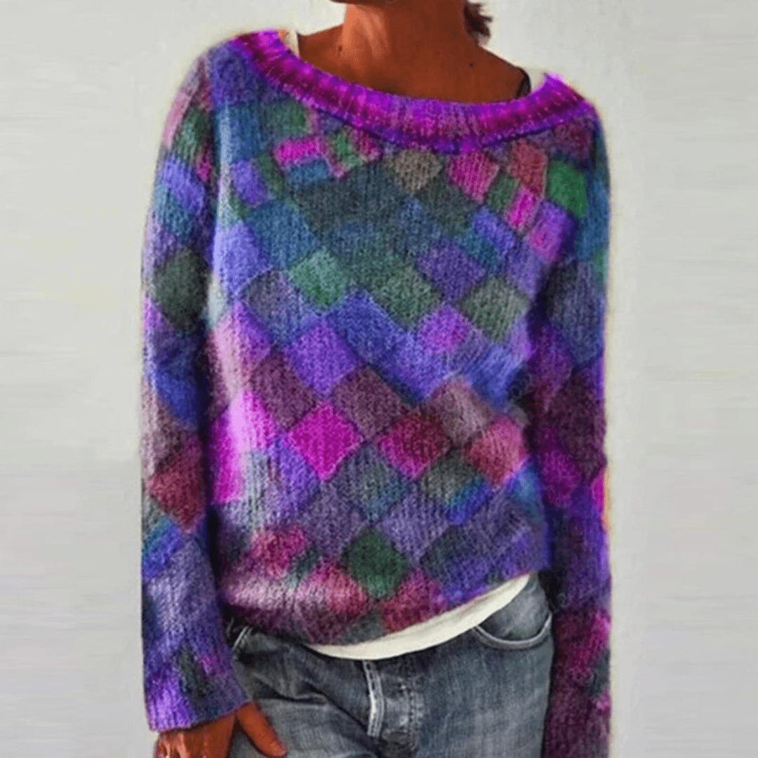 Maglione donna a girocollo, vivace fantasia multicolore. Un capo versatile per la moda invernale.