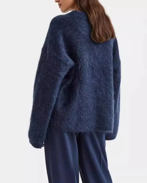 Maglione girocollo donna oversize, design morbido e avvolgente per un'eleganza quotidiana e confortevole.