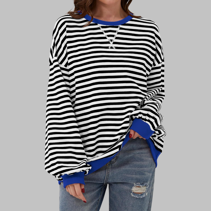 Pullover femminile a righe colorate, vestibilità ampia, stile vivace e alla moda per la donna.
