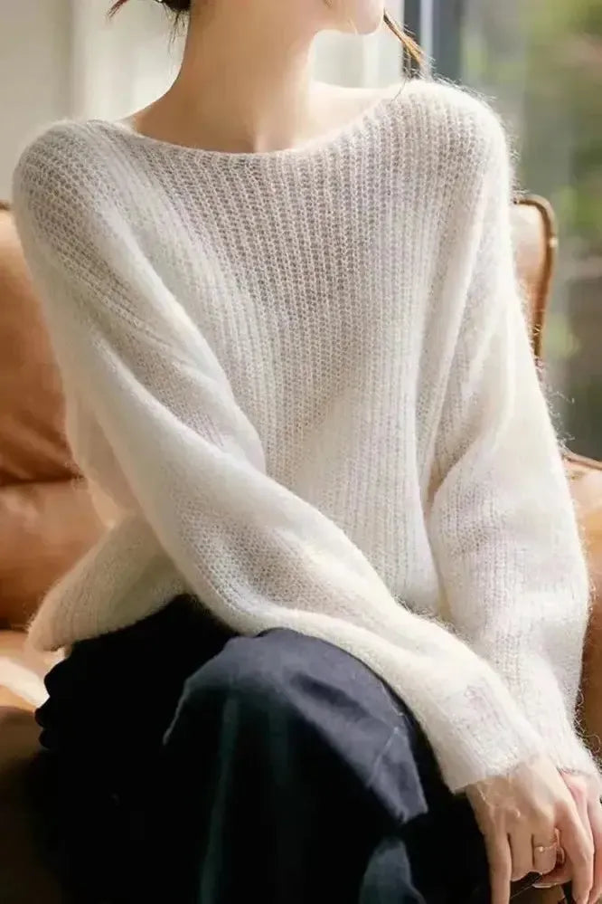 Maglione donna verde morbido e caldo, con scollo a barca, per comfort e stile quotidiano.