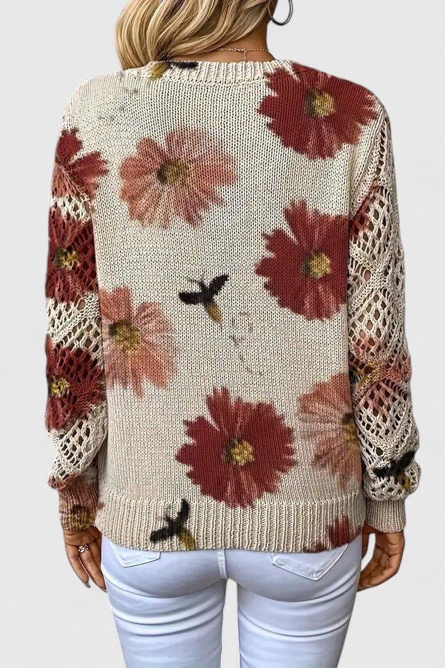 Maglia donna con motivo floreale e scollo a V, perfetta per outfit casual autunnali/invernali.