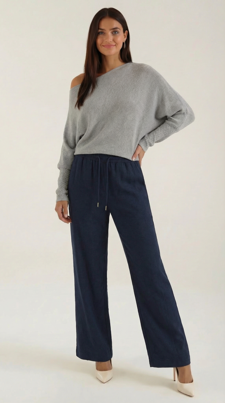 Caldo maglione donna spalla scoperta, design asimmetrico. Stile elegante e moderno.