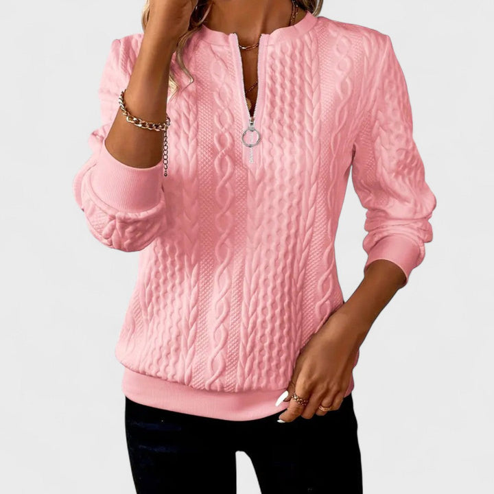 Maglione donna caldo con zip e raffinate trecce. Perfetto per l'inverno elegante e confortevole.