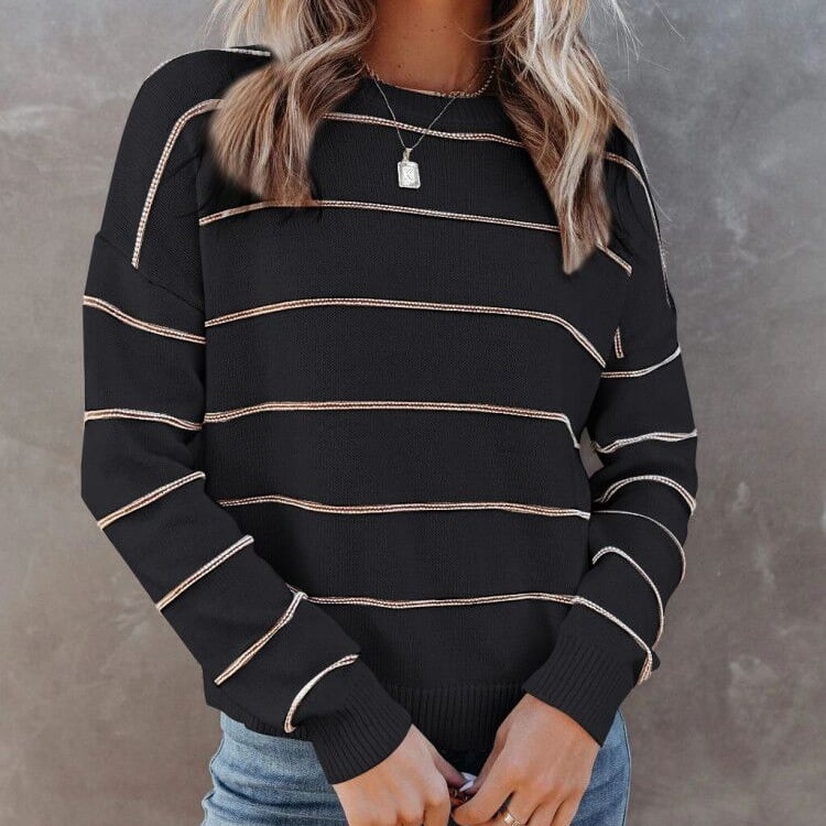 Maglione pullover donna a righe distintivo. Stile casual elegante e comfort quotidiano per moda femminile.