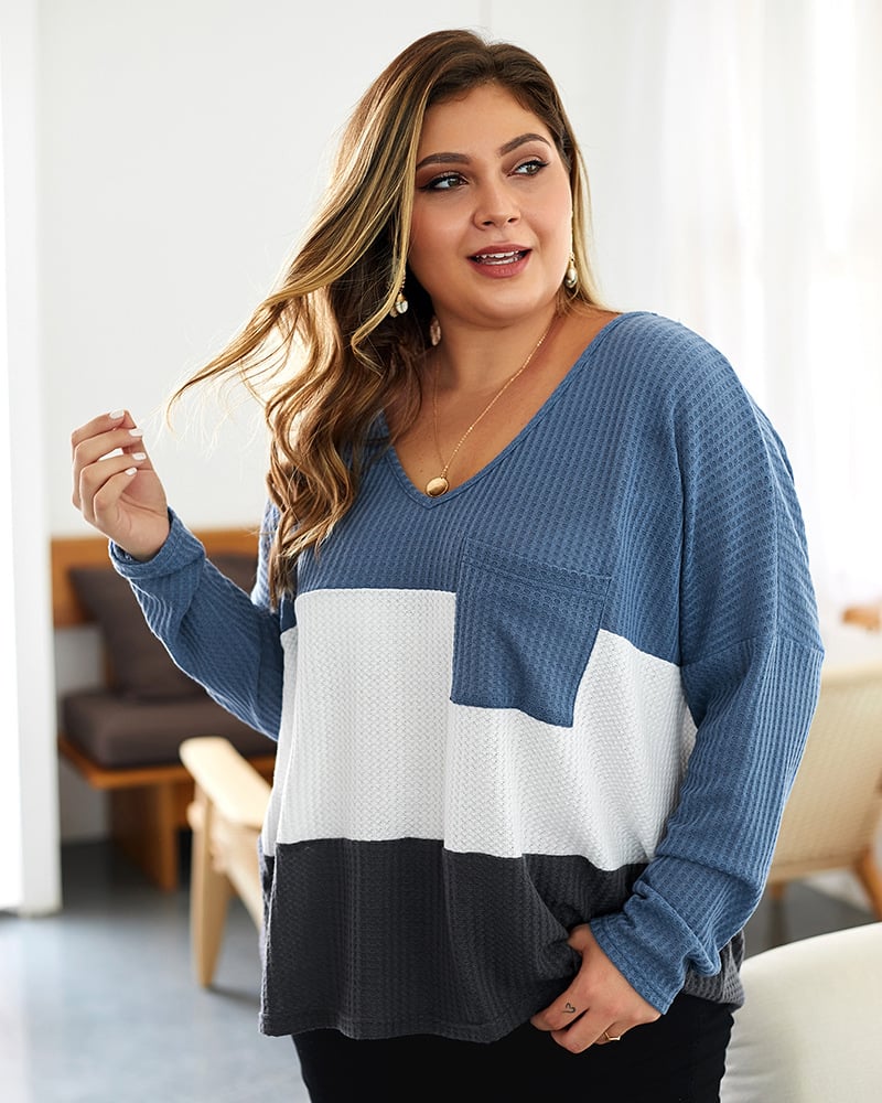 Pullover donna color-block con scollo a V, perfetto per look casual e moda invernale.