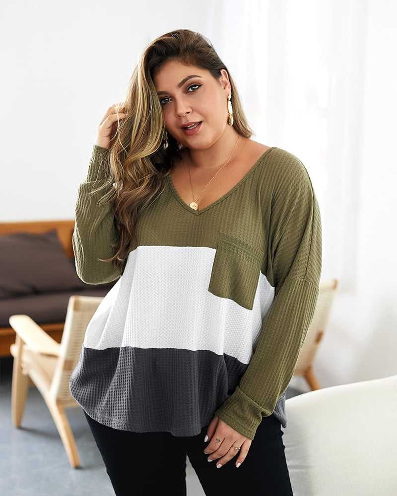 Maglione donna scollo a V color-block, design confortevole, ideale per autunno/inverno.