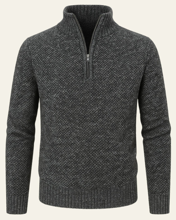 Maglione uomo in maglieria calda con collo alto e zip, offre comfort e stile casual per l'inverno.