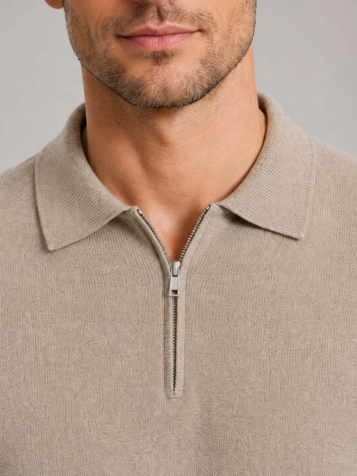 Maglione in maglieria uomo con collo polo e mezza zip, per un look invernale raffinato e confortevole.