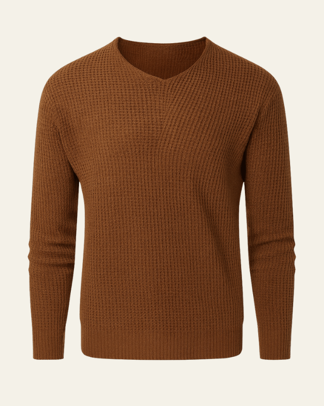 Maglione uomo confortevole a vestibilità regolare, scollo a V e texture waffle. Ideale per le stagioni fredde.