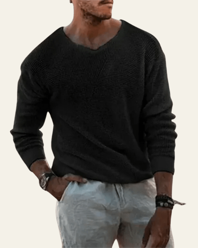 Maglione uomo versatile, scollo a V e trama waffle. Perfetto per outfit casual o eleganti. Must-have autunno inverno.