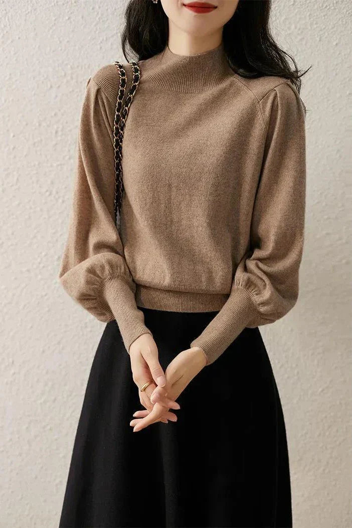 Maglione invernale da donna a collo rotondo. Caldo e di stile, è un capo essenziale per l'abbigliamento casual e chic.