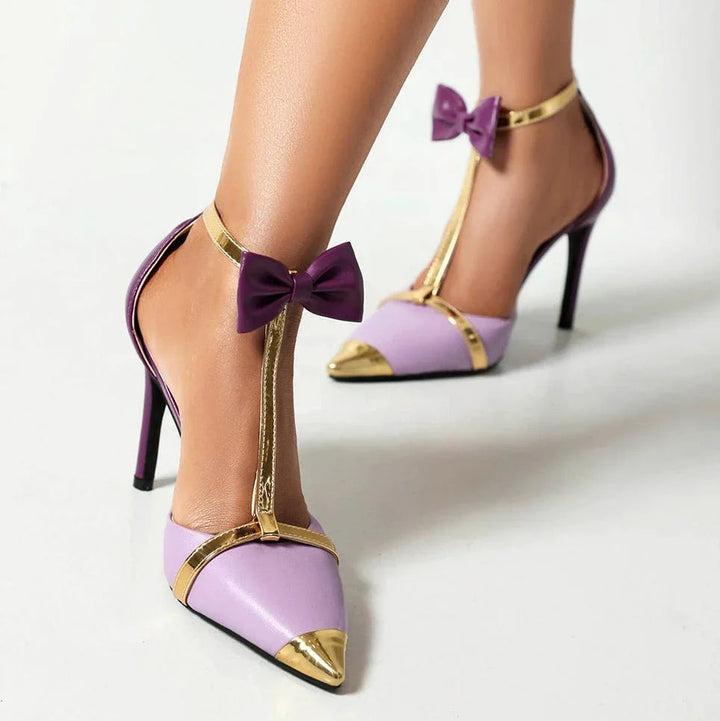 Décolleté donna lavanda con tacco a stiletto, punta affusolata, cinturino T-bar e fiocco. Scarpe eleganti.