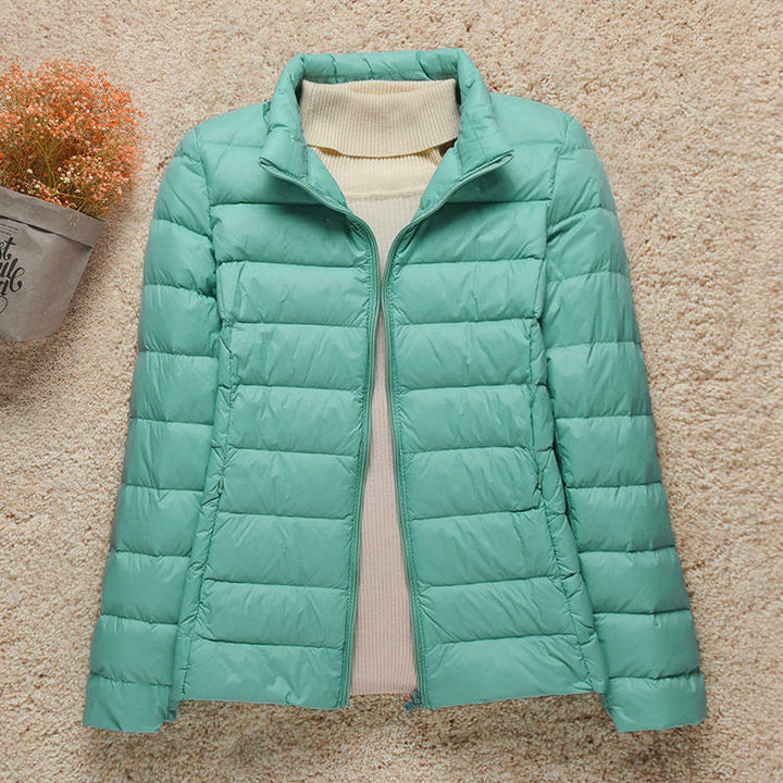 Giacca trapuntata ultraleggera da donna, vista frontale, design elegante per ogni outfit.