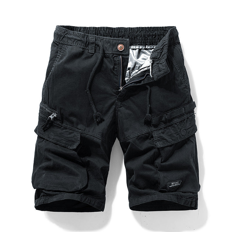 Shorts cargo uomo grigi con coulisse, vestibilità comoda e tasche funzionali, ideali per tempo libero e sport.
