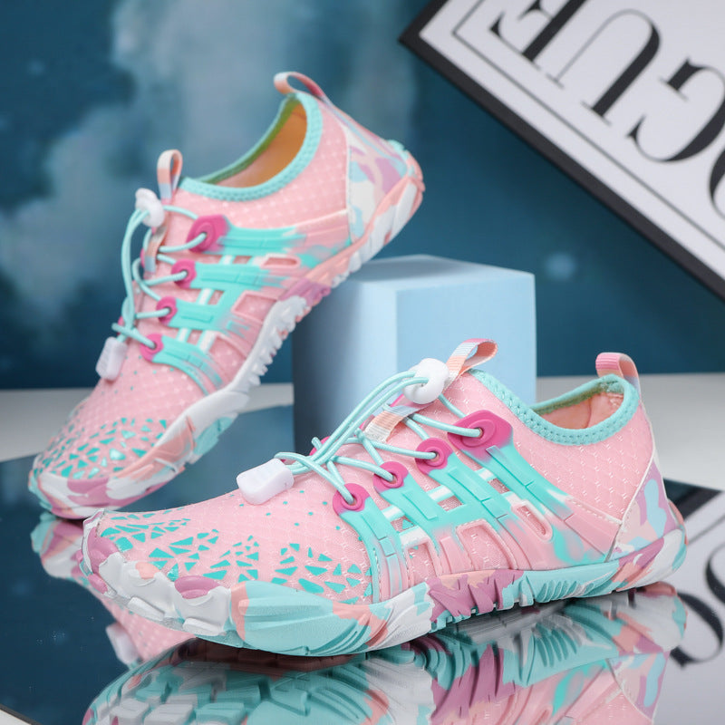 Scarpe da acqua uomo nere, flessibili e leggere, perfette per il comfort barefoot su ogni terreno.