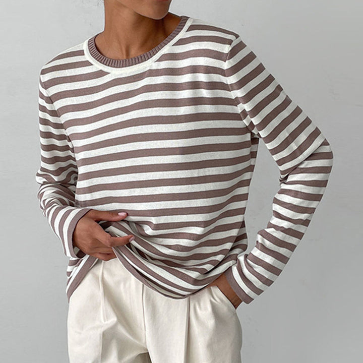 Morbida felpa donna a righe, maniche lunghe. Top casual girocollo per un look comodo e rilassato ogni giorno.