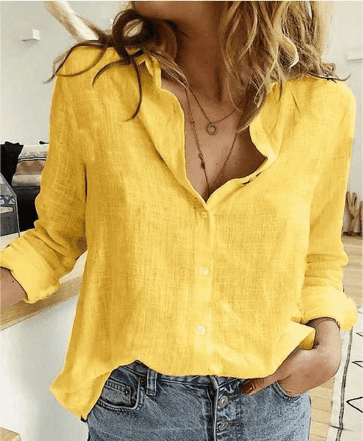 Nuovo arrivo: top donna a maniche lunghe con colletto morbido, blusa perfetta per un look moderno e chic.