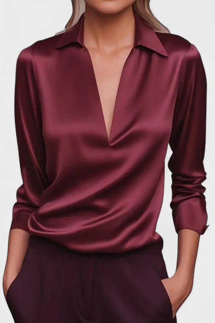 Top donna comodo a maniche lunghe e scollo V, ideale per la moda femminile di tutti i giorni.