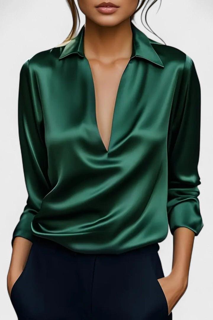 Moda femminile: top a maniche lunghe scollo V che unisce eleganza e comfort donna.