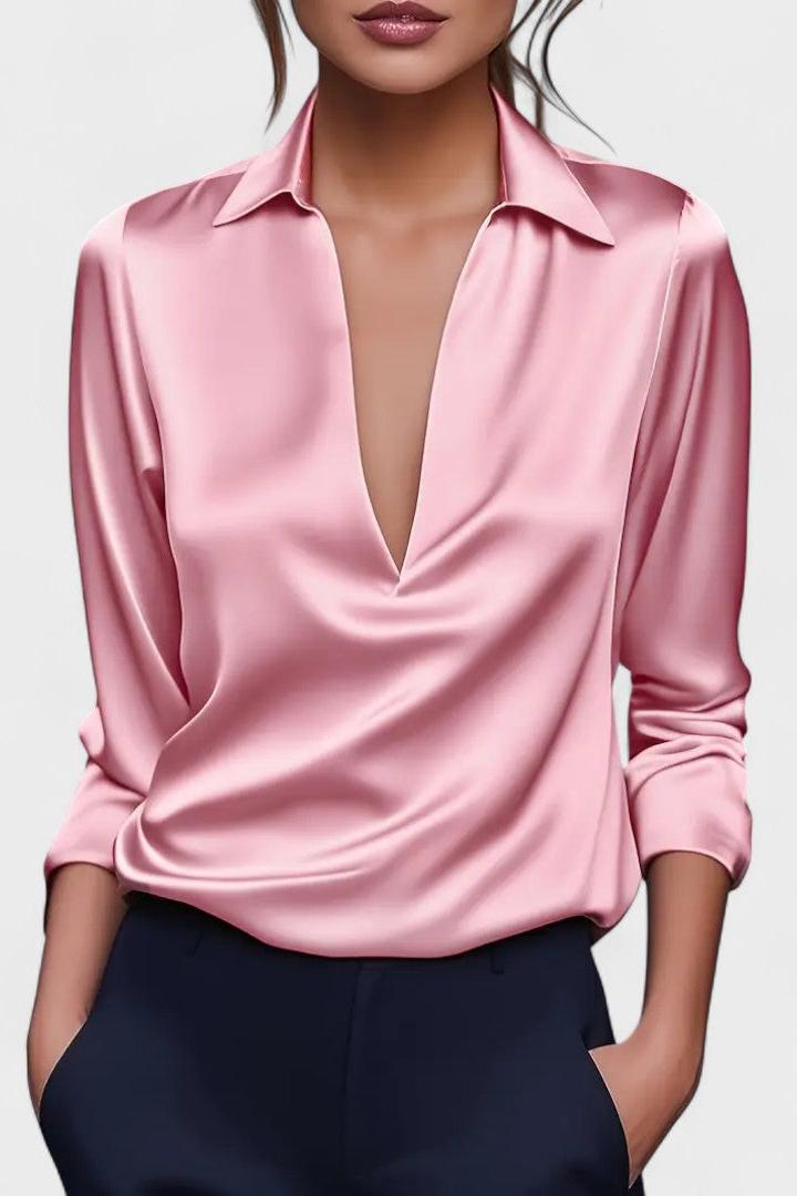 Top donna a maniche lunghe con scollo a V, elegante e confortevole per la moda femminile.