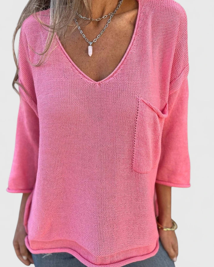 Top donna casual a maniche lunghe e scollo a V. Vestibilità rilassata, ideale per primavera/autunno, stile versatile.