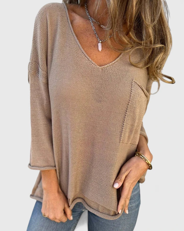 Top donna a maniche lunghe con scollo a V, vestibilità rilassata, in vari colori (kaki, rosa, bianco, verde, nero).