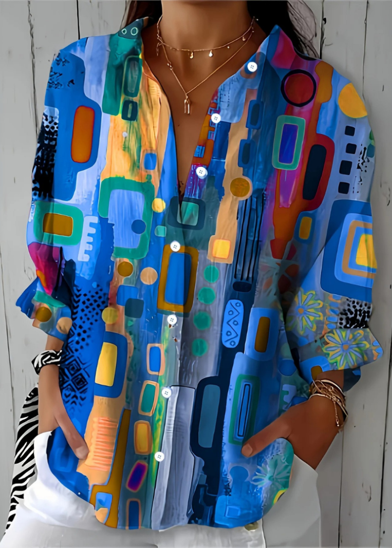 Top donna casual vivace a maniche lunghe con stampa artistica moderna. Aggiungi colore al tuo look estivo.