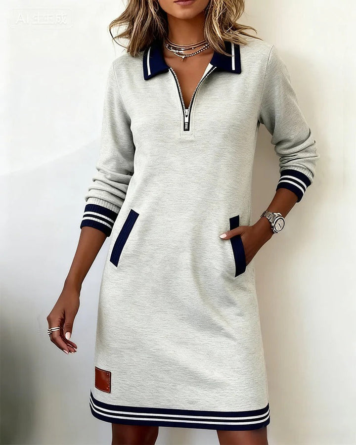 Abito midi donna stile polo, versatile per look casual o eleganti, con mezza zip e tasche.