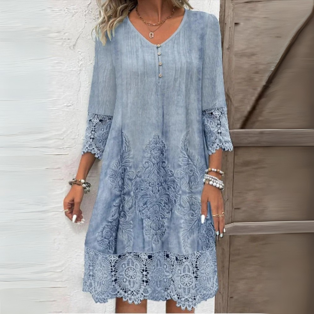 Vestito donna romantico con maniche lunghe e delicati dettagli traforati, ideale per primavera ed estate.