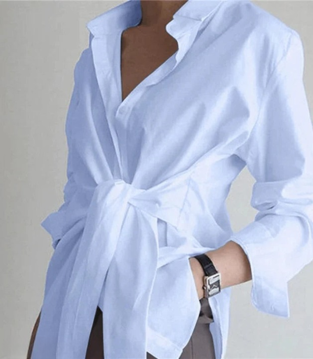 Camicetta elegante donna a maniche lunghe con nodo in vita, perfetta per ufficio e look casual chic.