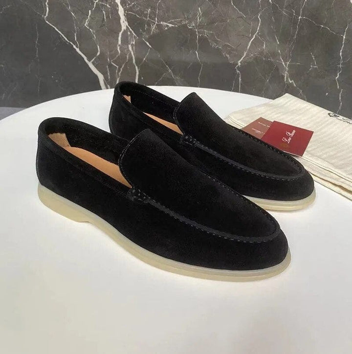 Mocassini eleganti uomo in pelle nera, stile formale o casual. Scarpe senza lacci, comfort duraturo per ogni stagione.