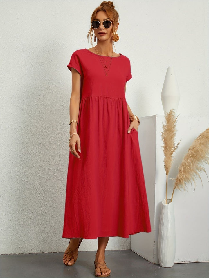 Abito estivo midi donna, design moderno e confortevole. Perfetto per le giornate più calde.