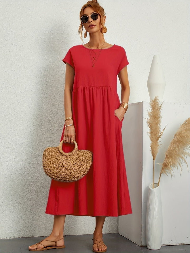 Abito midi elegante da donna, con un tocco di classe per la primavera. Stile unico e moderno.