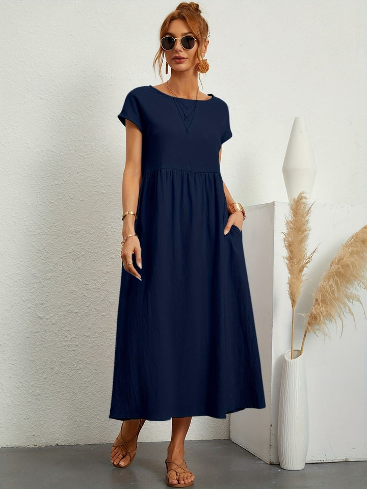 Abito midi primaverile da donna, perfetto per un look sofisticato e casual. Un capo versatile.