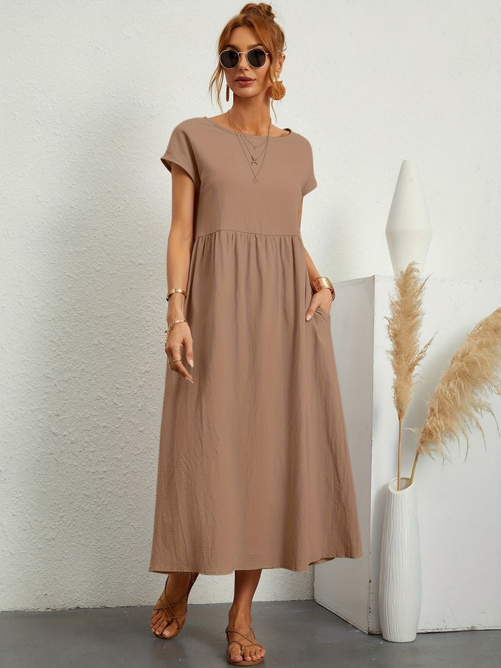 Vestito midi da donna, comodo e alla moda. Perfetto per le giornate estive e primaverili.