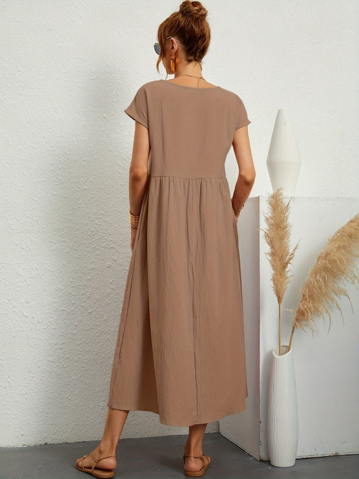 Abito midi estivo per donna, ideale per un look versatile e raffinato. Scegli il comfort chic.