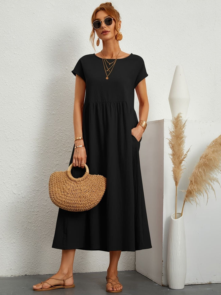 Abito midi casual chic, versatile per la donna moderna in primavera. Un look senza sforzo.