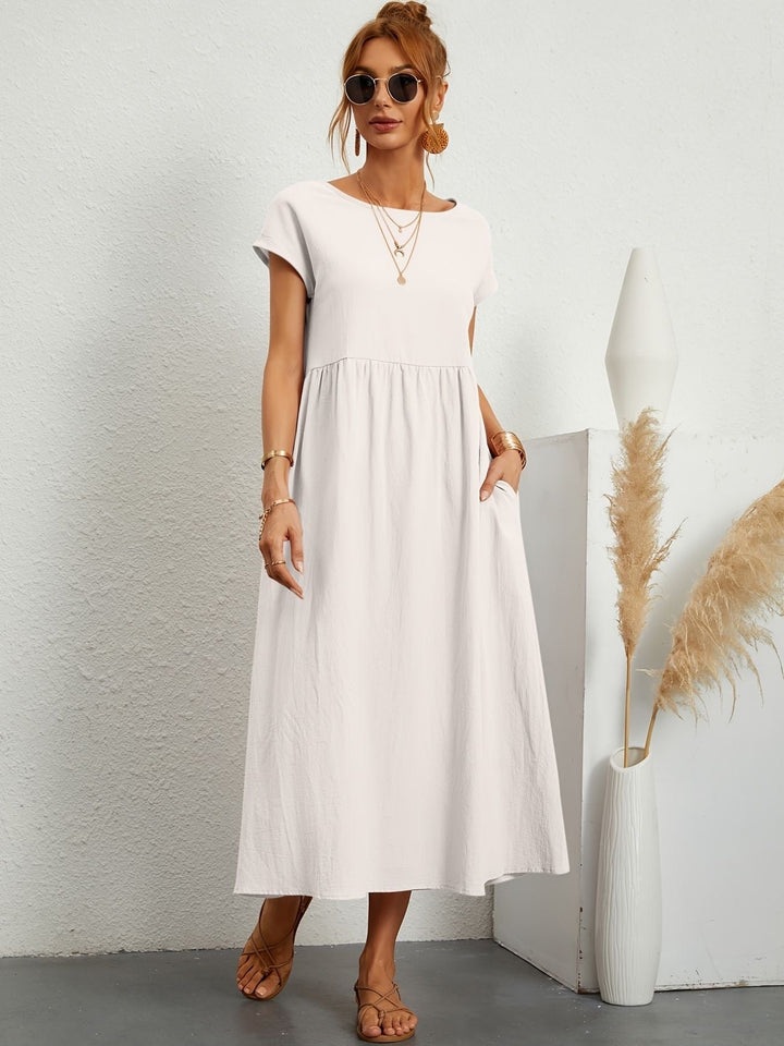 Abito midi elegante da donna, perfetto per la primavera e l'estate. Stile versatile e chic.