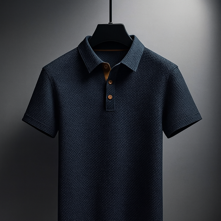 Polo uomo sportiva-elegante a maniche corte, vestibilità comoda e elasticizzata. Look versatile e moderno.