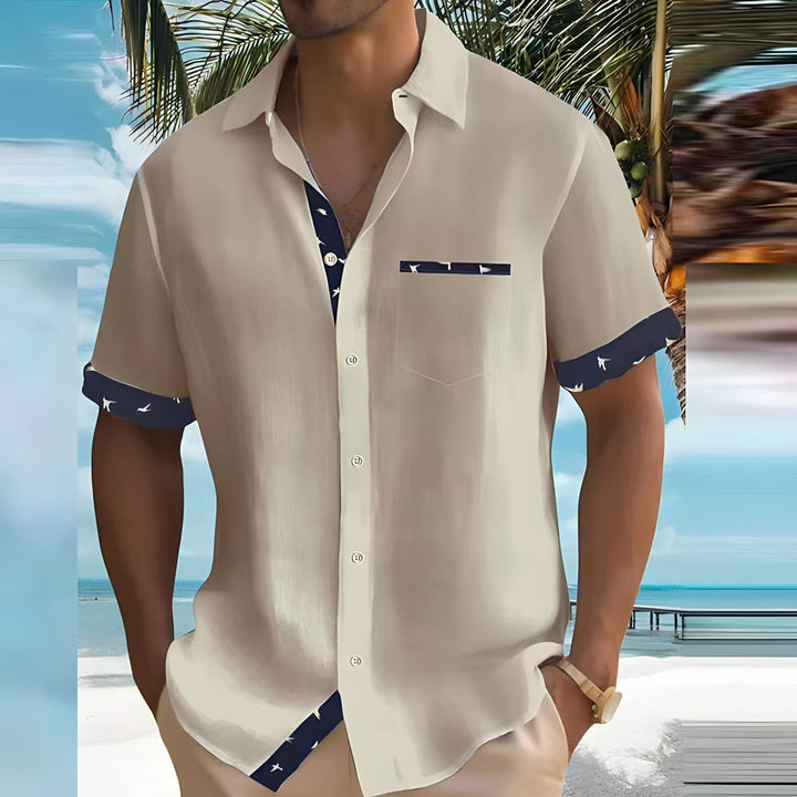 Camicia uomo estiva a maniche corte, leggera e casual. Perfetta per look estivi e comfort maschile.