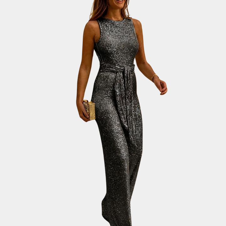 Outfit donna con tuta paillettes per brillare ad ogni festa. Elegante, scintillante, perfetta per occasioni speciali.