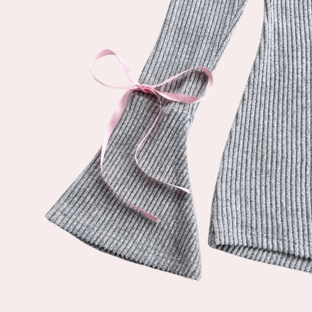 Combishort donna grigio, tuta corta elegante per un outfit estivo casual chic e moderno.