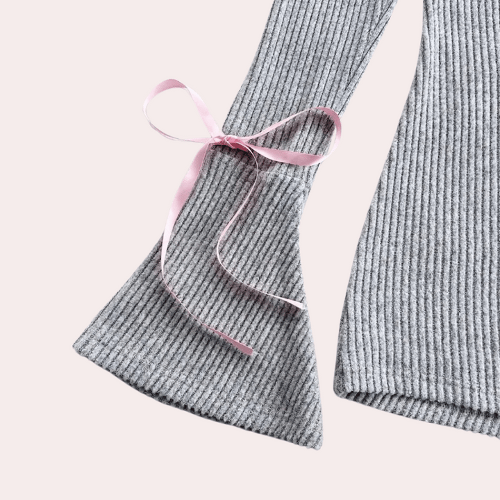 Combishort donna grigio, tuta corta elegante per un outfit estivo casual chic e moderno.