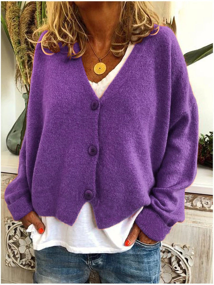 Cardigan lungo donna in maglia, perfetto per sovrapposizioni eleganti. Moda casual chic e ufficio, un must-have.